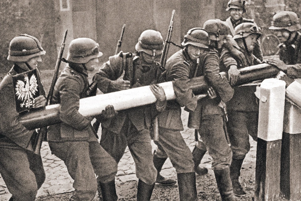 Знаменитый кадр. 1 сентября 1939 года. Немецкие войска демонтируют польские пограничные заграждения - так начиналась самая кровопролитная бойня в истории человечества. Фото: UniversalImagesGroup/Getty Images