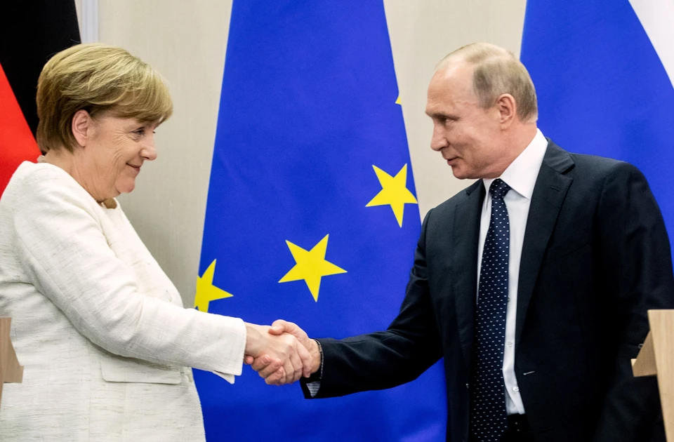 Владимир Путин и Ангела Меркель на пресс-конференции по итогам переговоров в Сочи, май 2018 г.