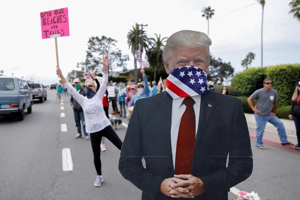 Американцы, недовольные карантином, выходят на митинги.