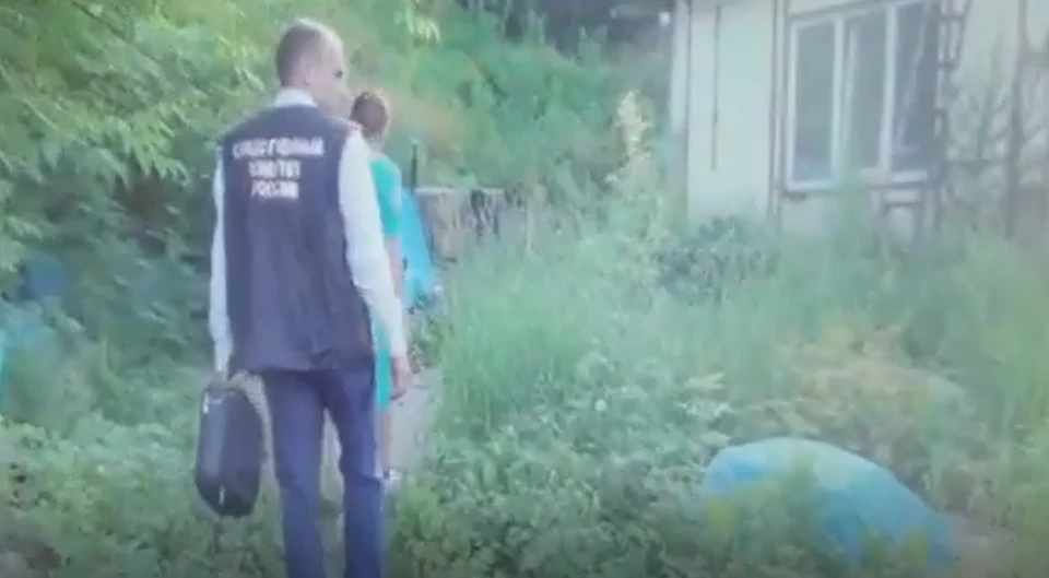 Кадр следственного эксперимента в Артеме