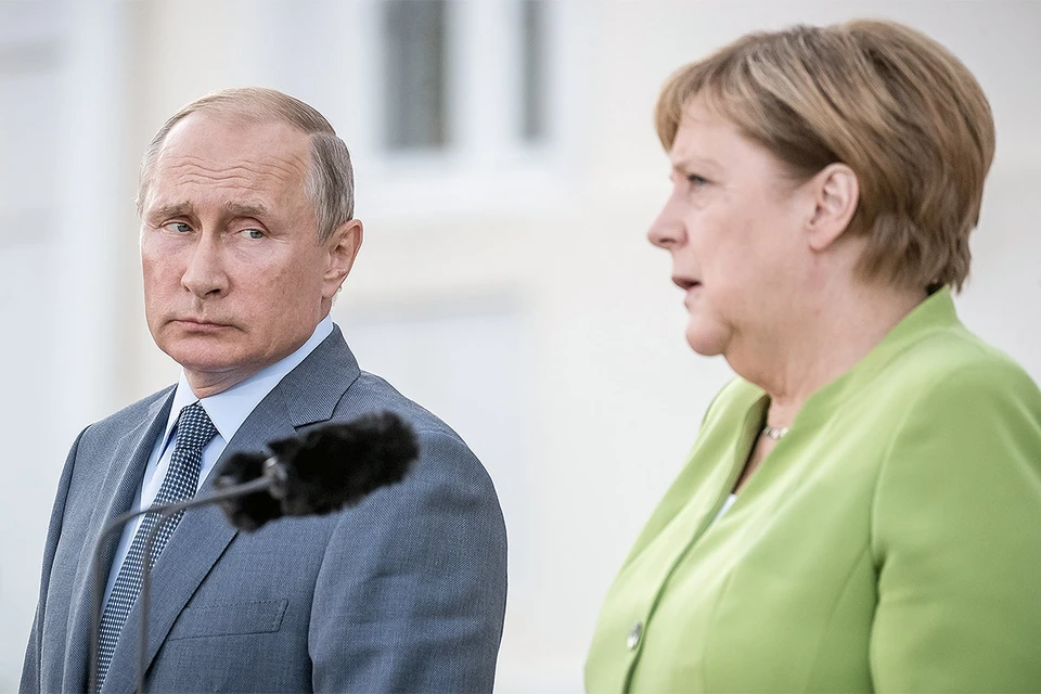 Владимир Путин и Ангела Меркель во время переговоров в Германии, 2018 г.
