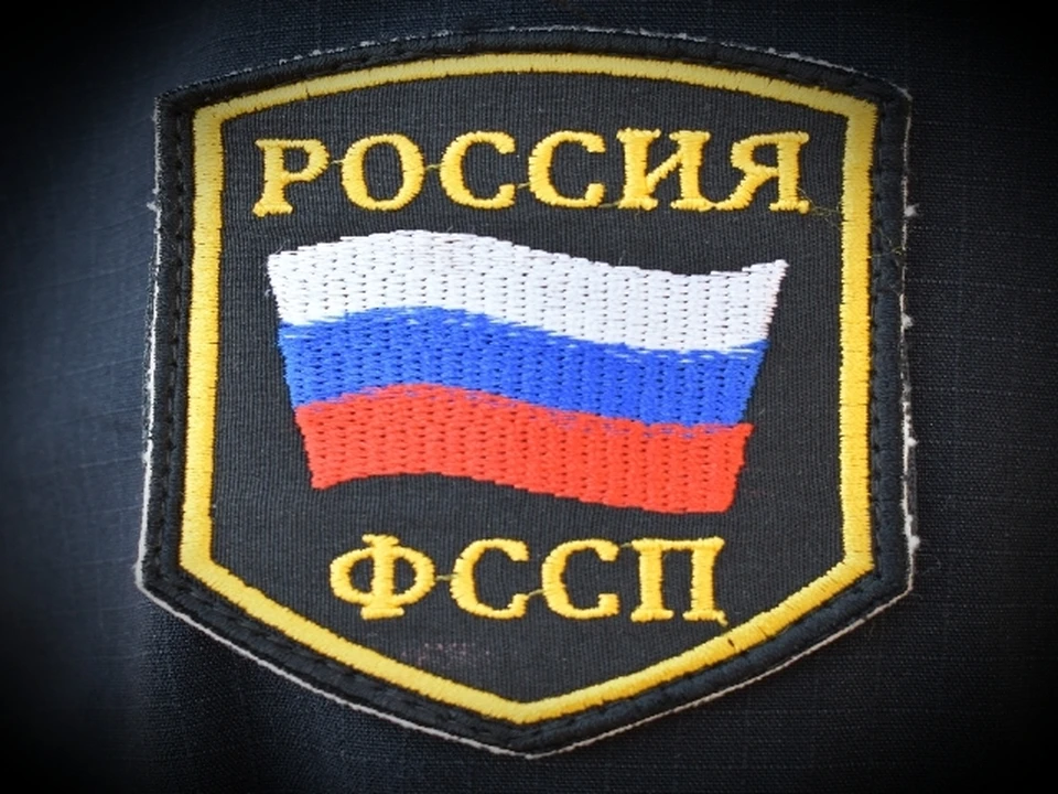 Житель Грайворонского района оплатил задолженность перед военным институтом. Фото пресс-службы УФССП России по Белгородской области