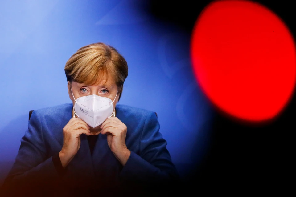 Ангела Меркель во время пресс-конференции в Берлине.