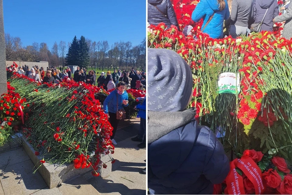 Тысячи красных гвоздик легли к мемориалу на Пискаревском кладбище.