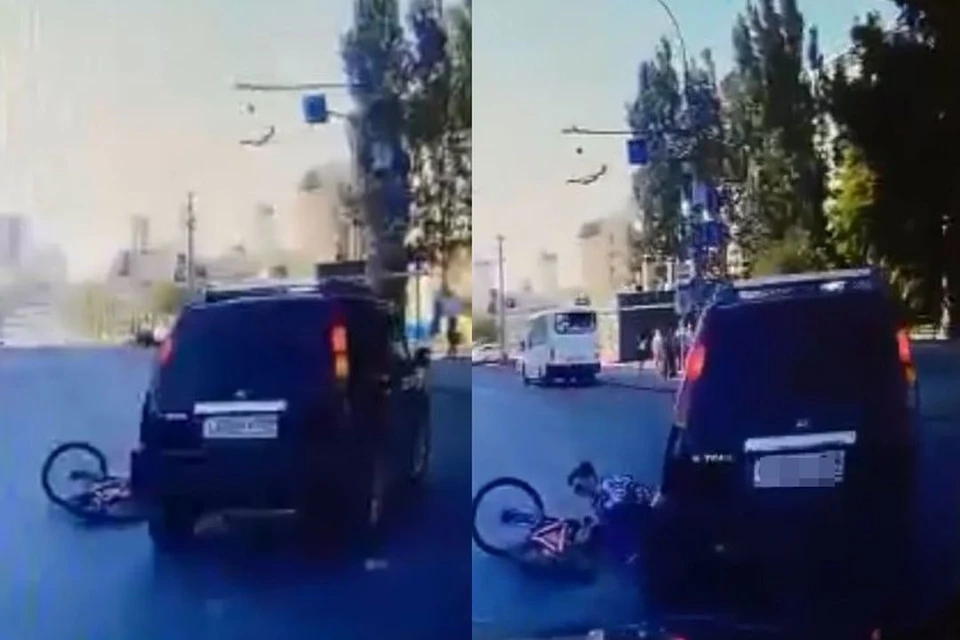 В Новосибирске иномарка сбила велосипедиста на пешеходном переходе. Фото: Кадр из видео