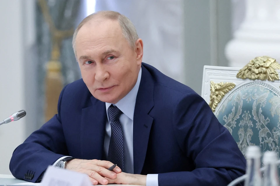 Владимир Путин пожал руку потерявшему зрение блогеру Ерхову