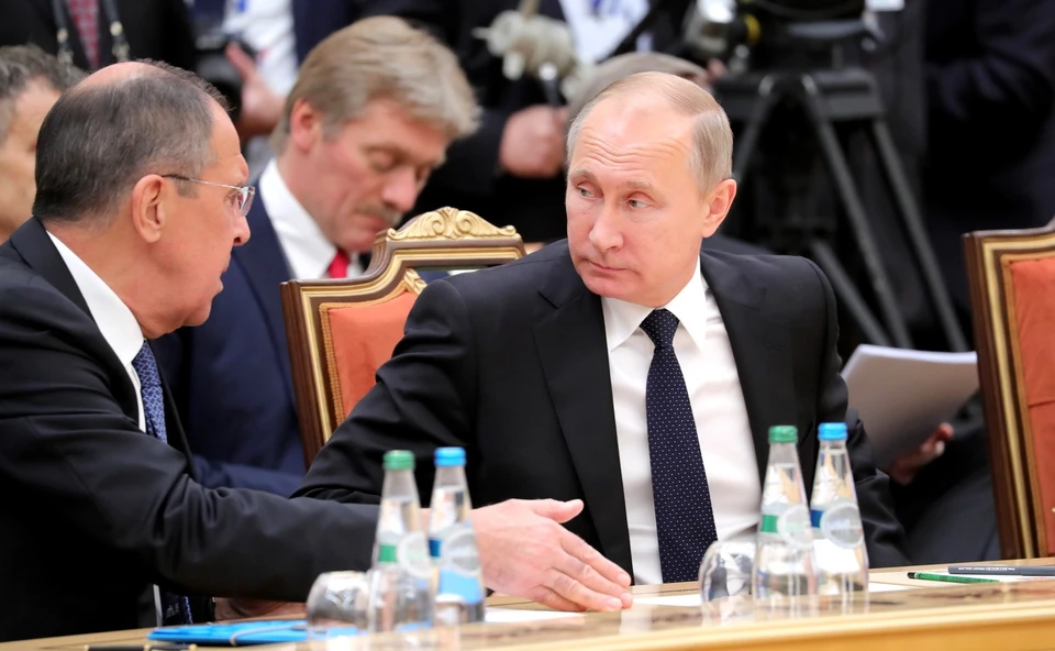 Президент РФ Владимир Путин и глава МИД России Сергей Лавров