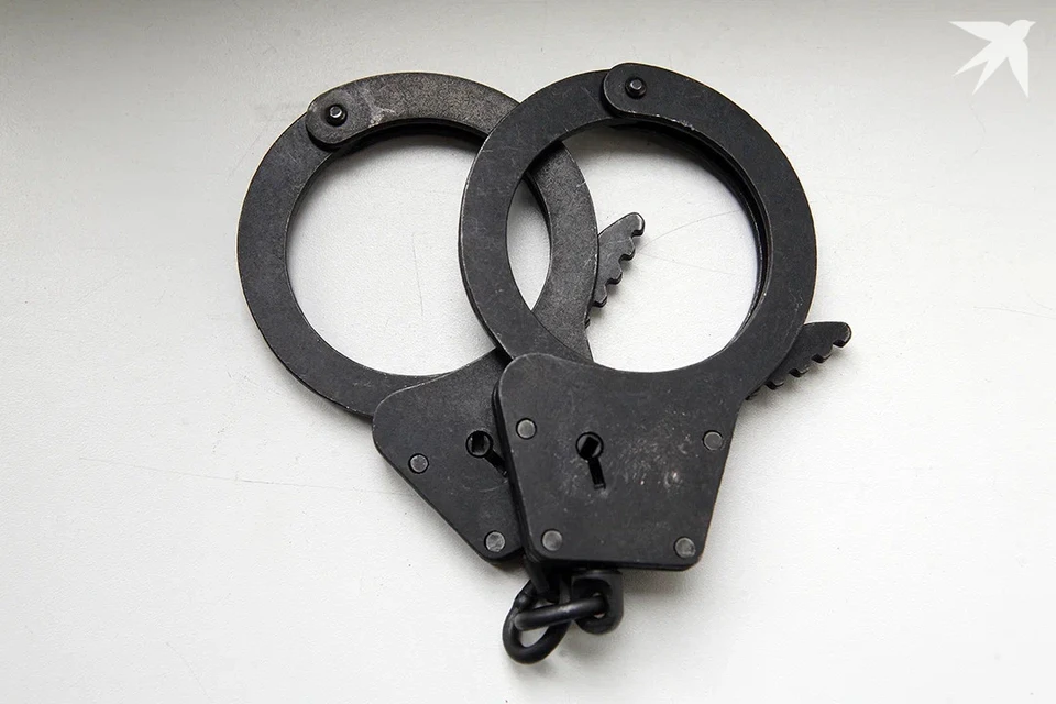 В Беларуси ОМОН задержал троих руководителей предприятий за взятки 100 000 рублей. Снимок носит иллюстративный характер.