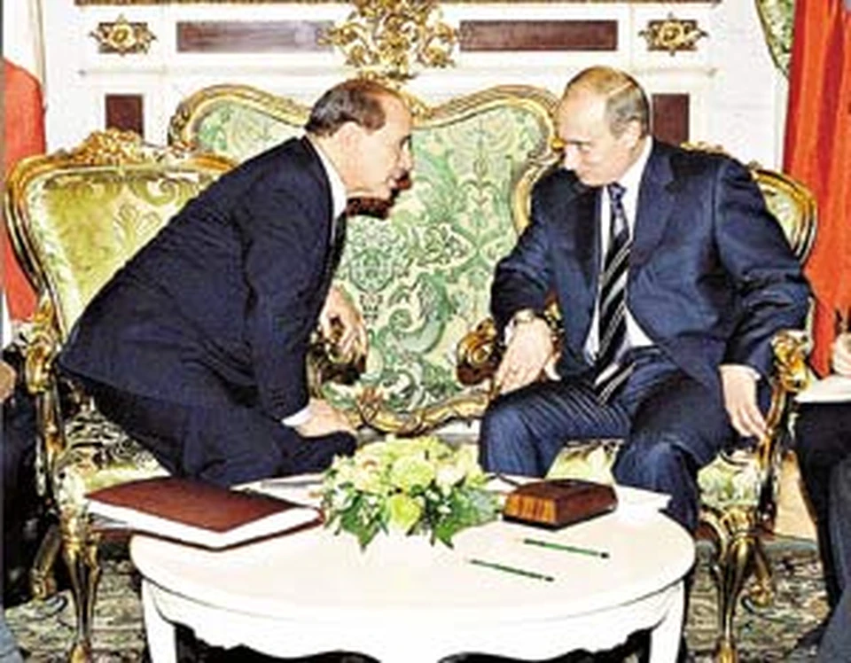 Путин и Берлускони обсуждают возможные итоги выборов в США.